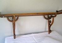 Stick and ball wall shelf